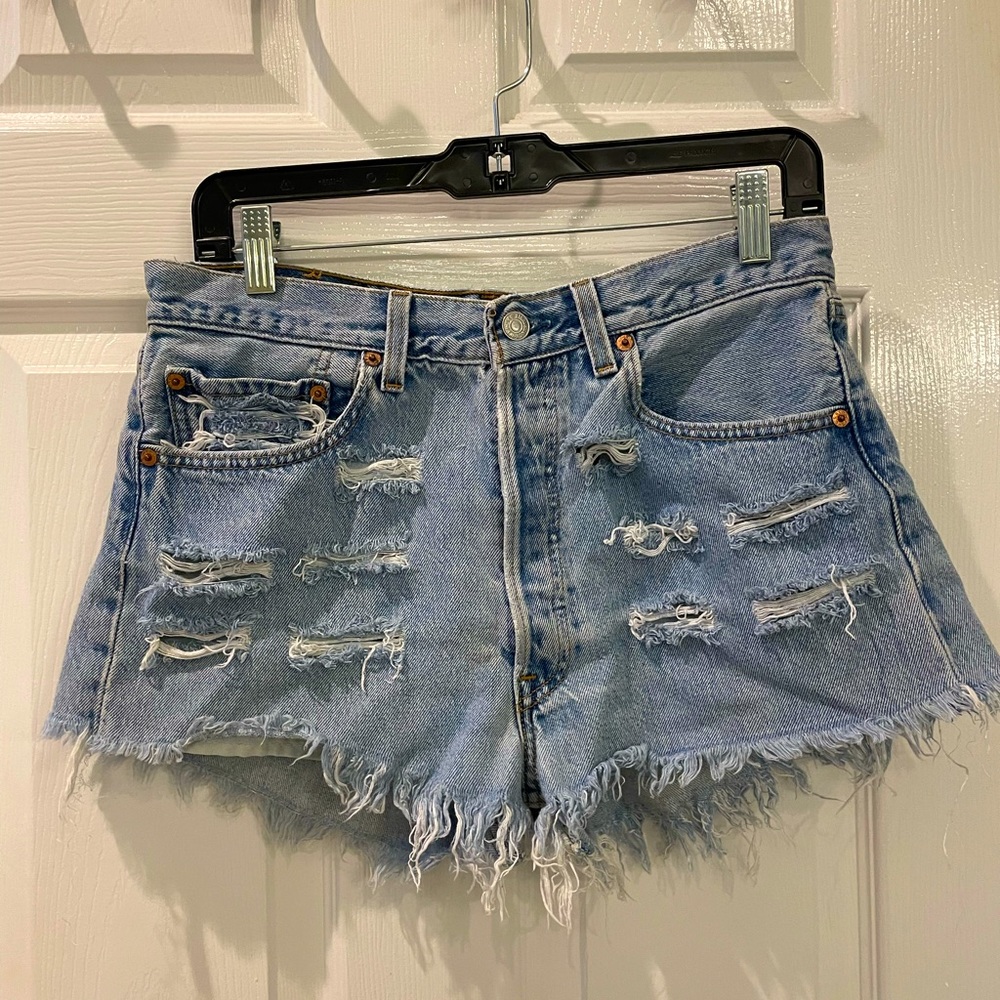 Vintage Destroyed High Rise Levi’s Jean shorts